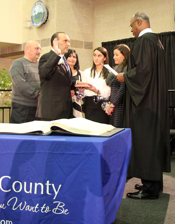 Thomas A. Arnone is sworn into his second three-year term as freeholder by Judge Lawrence Lawson.